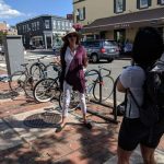 CIA veteran Rosanna Minchew Spyher Founder speaking on Georgetown, DC Walking Spy Tour pic in front of Martin Tavern